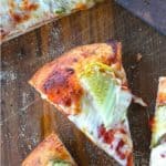 reamy garlic dill sauce, molten cheese, and a scandalous amount of garlicky dill pickles make this Pickle Pizza a memorable, delicious, and habit forming departure from your average pizza. Make with homemade pizza dough or store-bought dough, but do make it!