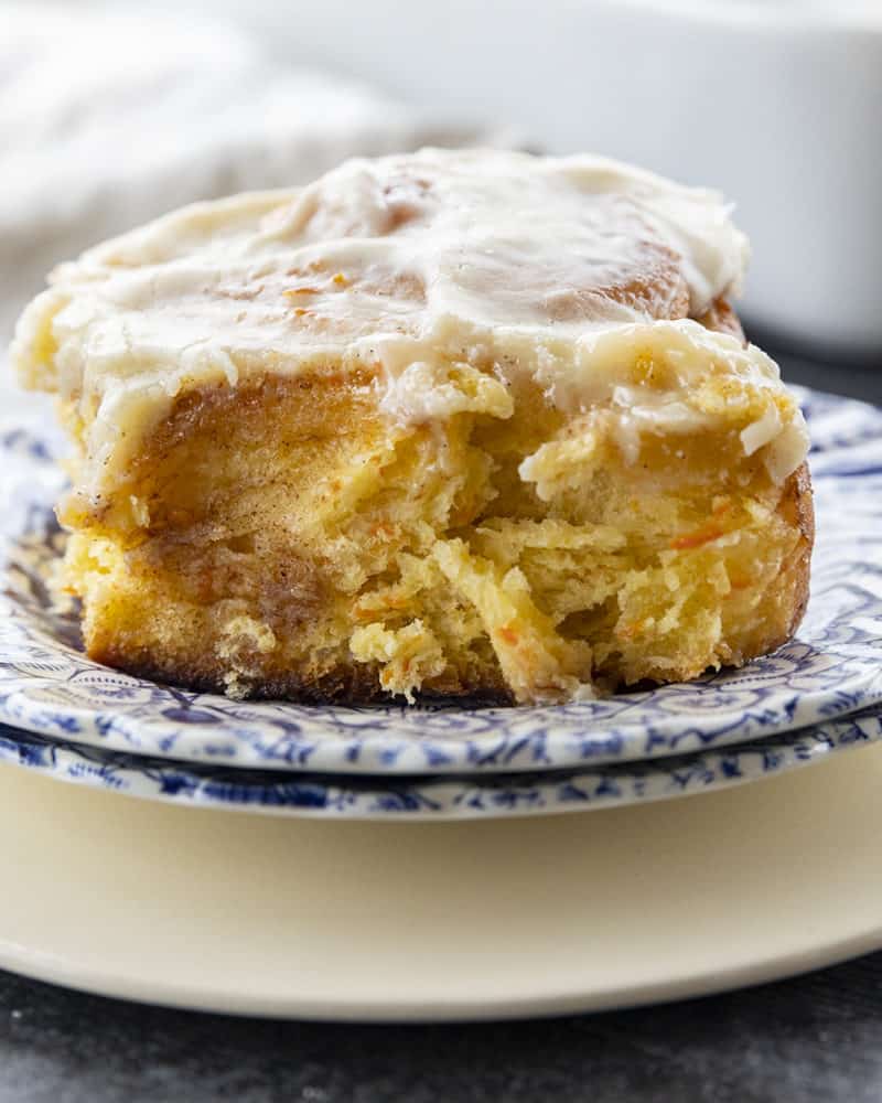 Carrot Cake Rolls are big, FLUFFY AS A CLOUD, & positively studded with super fine shreds of sweet carrots before being rolled up around a spiced buttery brown sugar filling.