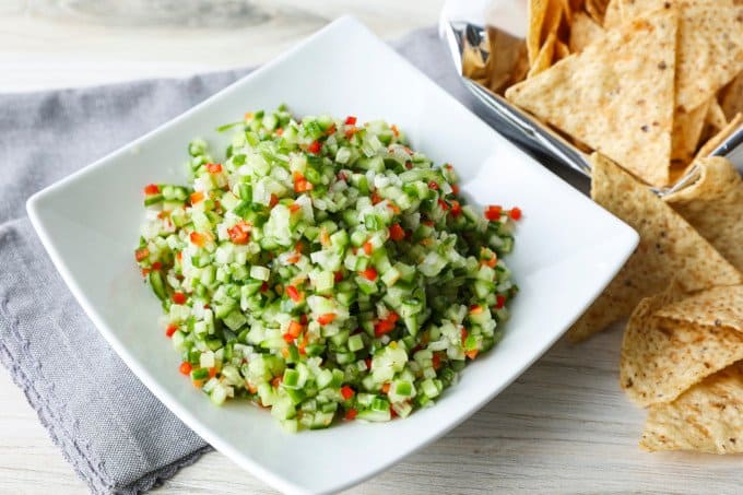 Pickle de Gallo combines everything you love about garlicky dill pickles with the crunch of fresh cucumbers, red bell peppers, and onions, and the snackability of pico de gallo or salsa. It's about to be your new favourite thing.