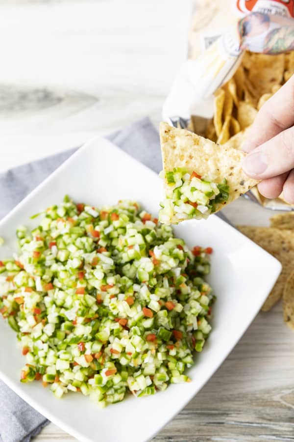 Pickle de Gallo combines everything you love about garlicky dill pickles with the crunch of fresh cucumbers, red bell peppers, and onions, and the snackability of pico de gallo or salsa. It's about to be your new favourite thing.