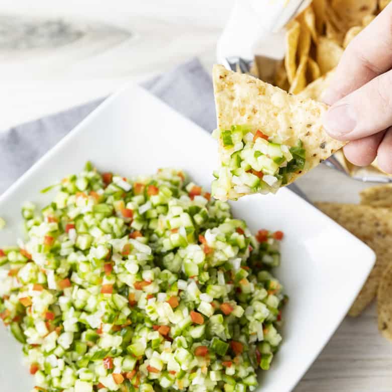 Pickle de Gallo combines everything you love about garlicky dill pickles with the crunch of fresh cucumbers, red bell peppers, and onions, and the snackability of pico de gallo or salsa. It's about to be your new favourite thing.