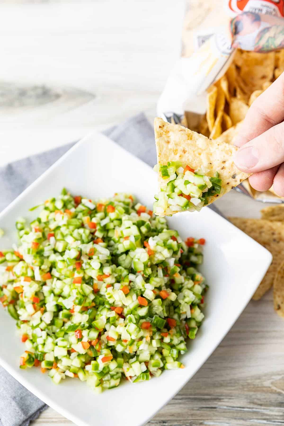 Pickle de Gallo combines everything you love about garlicky dill pickles with the crunch of fresh cucumbers, red bell peppers, and onions, and the snackability of pico de gallo or salsa. It's about to be your new favourite thing.