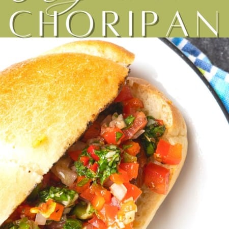 Choripan: Garlicky, spicy, smoky chorizo sausage is slowly grilled to perfection before being split, seared over high heat, and served on a bun with fresh chimichurri sauce and salsa a la criolla; the messier the better!