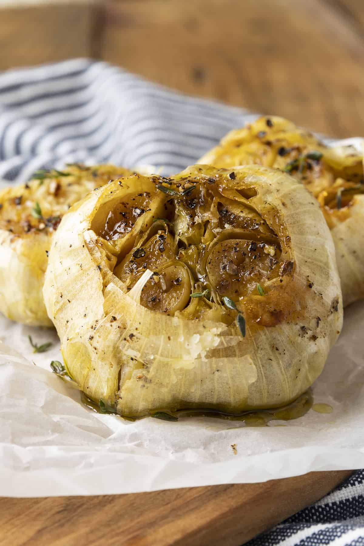 Tender, mellow, buttery roasted cloves of garlic. This easy air fryer recipe will set you up with a generous amount of golden brown, sweet, roasted garlic in far less time than traditional oven roasted garlic.