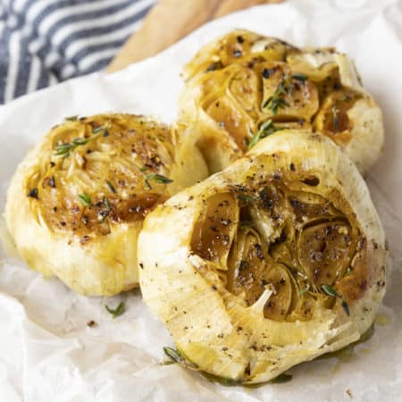 This simple “How to Roast Garlic in the Oven” will set your favourite garlic lover up for everything between a tiny and giant quantity of luscious, buttery cloves of meltingly soft garlic. Make enough to use tonight or enough to stash in the freezer for fast dinner fixes all year long!