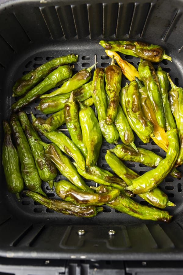 If you're looking for a great snack or the perfect appetizer, look no further than Shishito Peppers Air Fryer style. This super easy recipe for a tasty snack is made from simple ingredients and takes only 3 to 5 minutes of air frying.