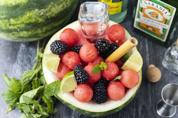 You deserve this dazzlingly gorgeous, super refreshing Watermelon Cocktail bursting with watermelon, berries, the spirit of your choice, and fizzy water. Served up in half of a personal watermelon, there’s simply nothing more party ready than this fabulous watermelon drink that’s a fruit salad and a cocktail all in one!