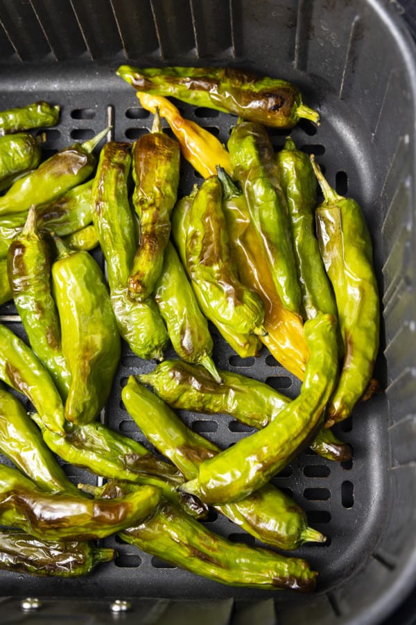 If you're looking for a great snack or the perfect appetizer, look no further than Shishito Peppers Air Fryer style. This super easy recipe for a tasty snack is made from simple ingredients and takes only 3 to 5 minutes of air frying.