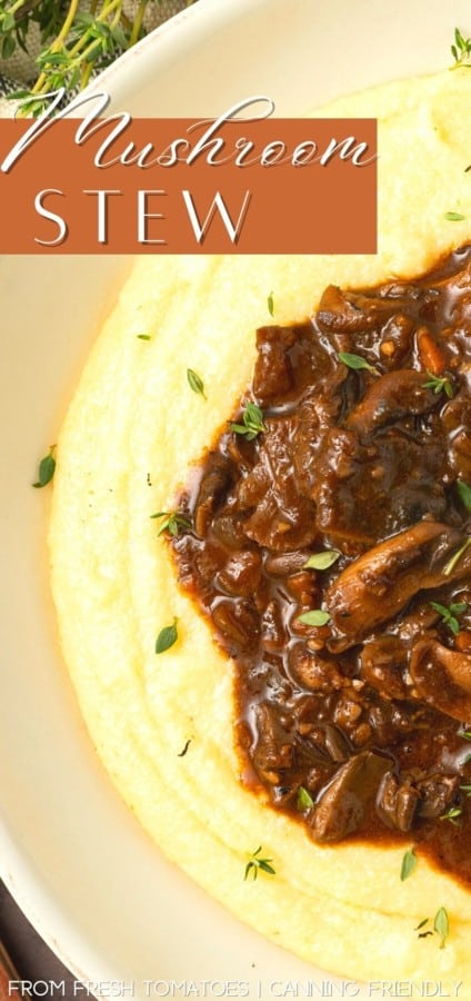 Mushroom stew over polenta in a pottery bowl with thyme nearby.