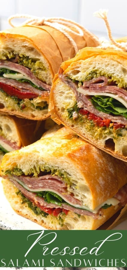 This is no ordinary Salami Sandwich; a crusty baguette is stuffed to bursting with a variety of salamis, roasted red pepper, pesto sauce, provolone cheese, fresh basil, and dressed arugula, then tightly wrapped and stashed in the refrigerator overnight. Then you can slice it all up and arrange it on a platter for a party or stretch it out for up to 5 days! And let me tell you, if you slice a little off of this every day for lunch with a cup of soup or bag of chips, you're going to feel very clever indeed. If you're feeling generous, pop it in a lunch bag for a school lunch that will make your kid the envy of the school.