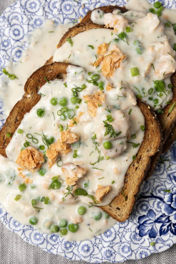 This comforting, delicious creamed salmon recipe is unapologetically old-fashioned. Served over your favourite toast, rice, or hot egg noodles, you can’t beat this ultra-fast meal option for breakfast, lunch, or dinner. This is an ultra budget friendly version of classic salmon in cream sauce. You can make it as written or make it your own by getting creative! The recipe includes some delicious variations on the theme and ideas for substituting ingredients.