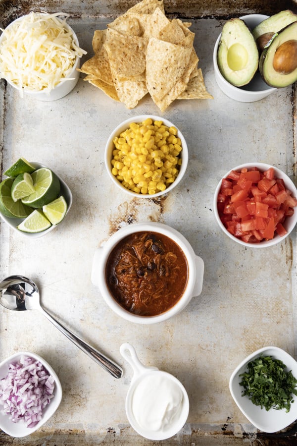 You’ve got to love 5 Ingredient Taco Soup both for the exuberantly flavourful taco flavour and for the incredible ease with which it’s prepared. Any meal that comes together in 15 minutes and makes my whole family happy has my heart and this quick and easy soup fits that bill! As if that wasn’t enough to recommend this taco soup is customizable based on your own personal preferences and what you have on hand.