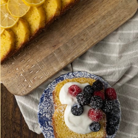 A French Yogurt Cake is quite possibly the most bright and sunny, tender, and just-sweet-enough cake in the entire world. This cake is topped with a thin lemon glaze that firms up and shatters into sugary crust when you bite into it and was brought to world by generation upon generation of French grandmothers and the children who love them!