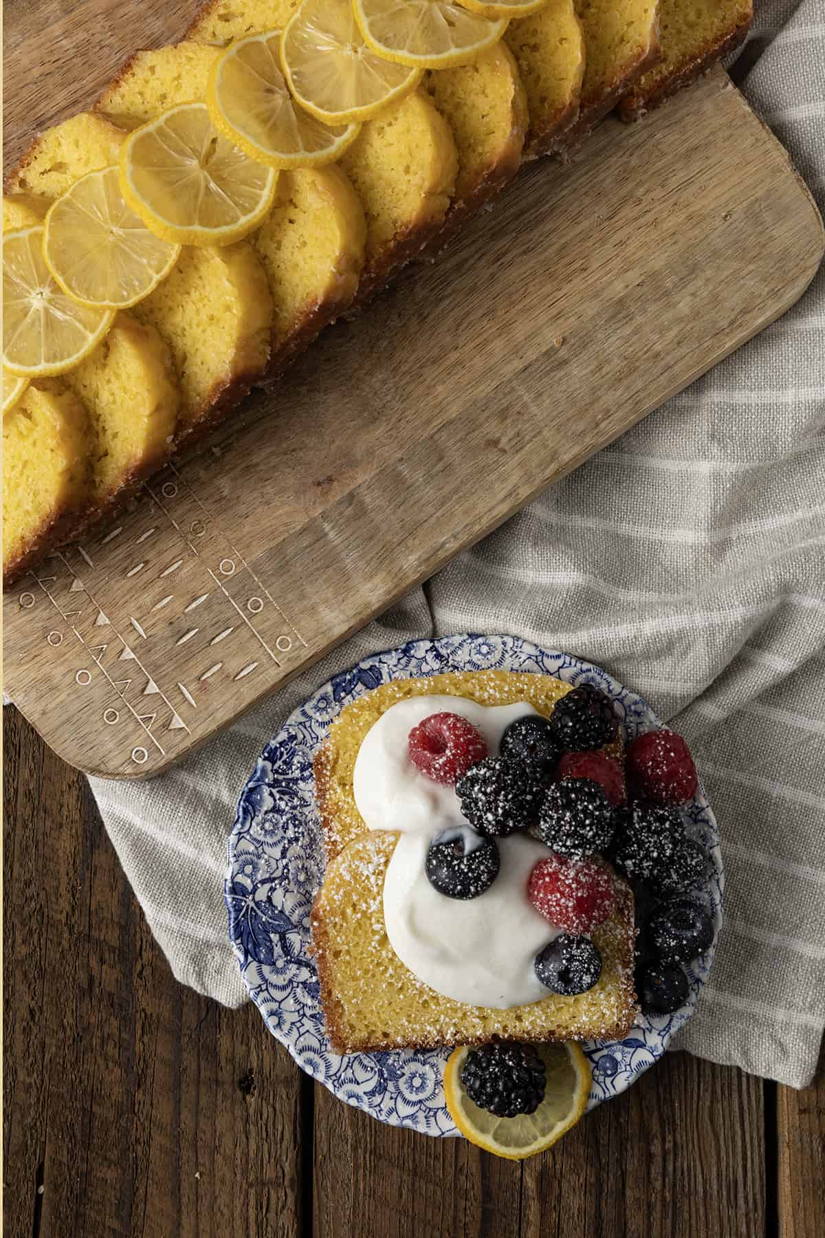 A French Yogurt Cake is quite possibly the most bright and sunny, tender, and just-sweet-enough cake in the entire world. This cake is topped with a thin lemon glaze that firms up and shatters into sugary crust when you bite into it and was brought to world by generation upon generation of French grandmothers and the children who love them!
