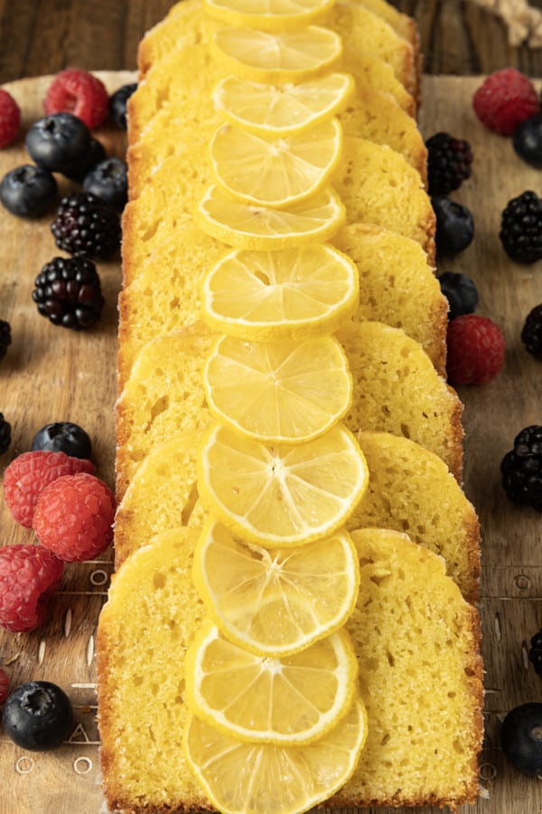 A French Yogurt Cake is quite possibly the most bright and sunny, tender, and just-sweet-enough cake in the entire world. This cake is topped with a thin lemon glaze that firms up and shatters into sugary crust when you bite into it and was brought to world by generation upon generation of French grandmothers and the children who love them!