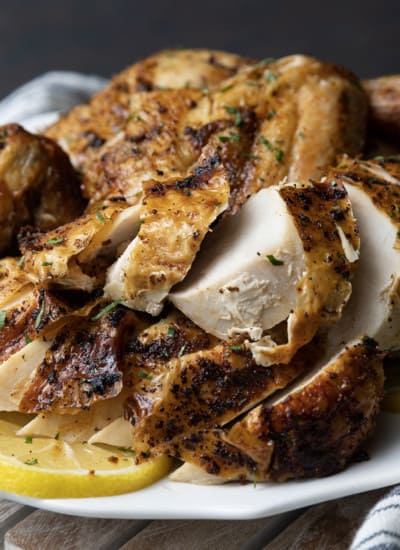 Crisp skinned and succulent, this air fryer whole chicken will become a weeknight regular thing. It is faster than oven roasting and creates a juicy, tender rotisserie style chicken! Let the air fryer do the work for you! This is one of my all time favourite ways to cook a whole chicken. It honestly doesn’t get any easier (or tastier!) than this and the whole family loves it.