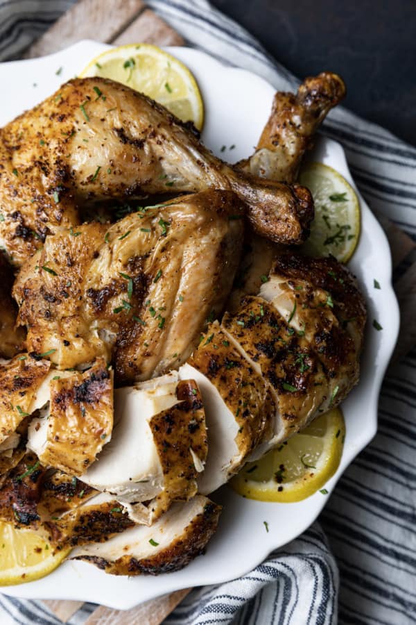 Crisp skinned and succulent, this air fryer whole chicken will become a weeknight regular thing. It is faster than oven roasting and creates a juicy, tender rotisserie style chicken! Let the air fryer do the work for you! This is one of my all time favourite ways to cook a whole chicken. It honestly doesn’t get any easier (or tastier!) than this and the whole family loves it.