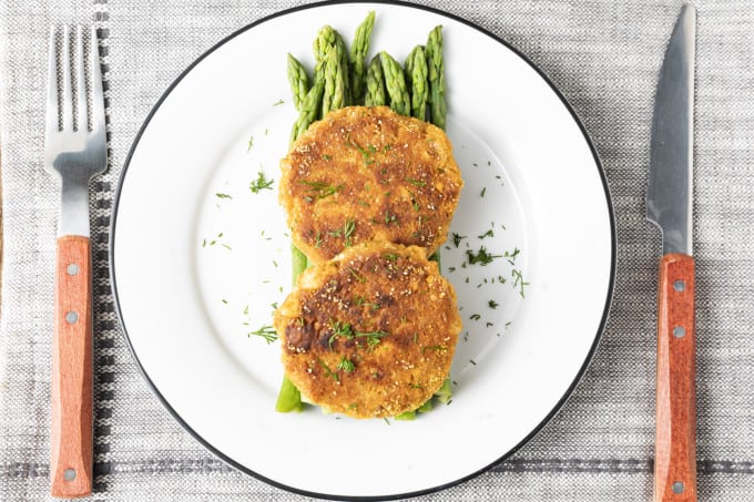 Made of simple ingredients from the pantry, our Old-Fashioned Salmon Patties recipe yields sizzling, golden brown salmon cakes that are crunchy on the outside and tender on the inside. This is one of the ultimate pantry staple recipes, using canned salmon, mayonnaise, cracker or bread crumbs, egg, and seasoning. Simple salmon patties (a.k.a. Salmon cakes or salmon croquettes) like these are ubiquitous in southern households for a reason. This classic recipe is tremendously budget friendly, unbelievably easy to make, and pleasing to even picky eaters!