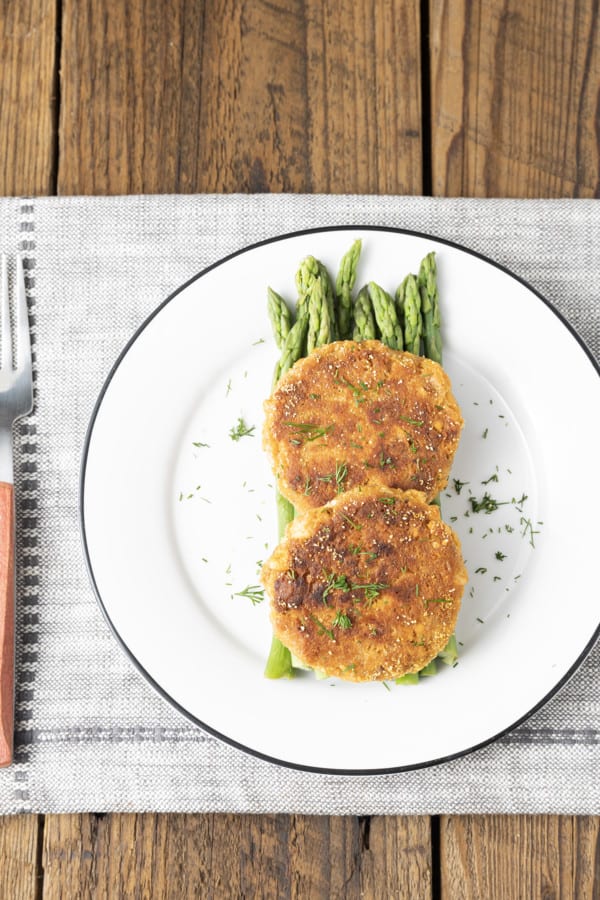 Made of simple ingredients from the pantry, our Old-Fashioned Salmon Patties recipe yields sizzling, golden brown salmon cakes that are crunchy on the outside and tender on the inside. This is one of the ultimate pantry staple recipes, using canned salmon, mayonnaise, cracker or bread crumbs, egg, and seasoning. Simple salmon patties (a.k.a. Salmon cakes or salmon croquettes) like these are ubiquitous in southern households for a reason. This classic recipe is tremendously budget friendly, unbelievably easy to make, and pleasing to even picky eaters!