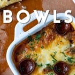 There’s no easier, more comforting dinner on the fly than this easy pizza bowl recipe! Garlicky marinara sauce, mozzarella cheese, pepperoni, succulent Italian sausage, and whatever else you love as pizza toppings are baked in individual servings until the cheese is bubbling and melted and the pepperoni is crispy at the edges.