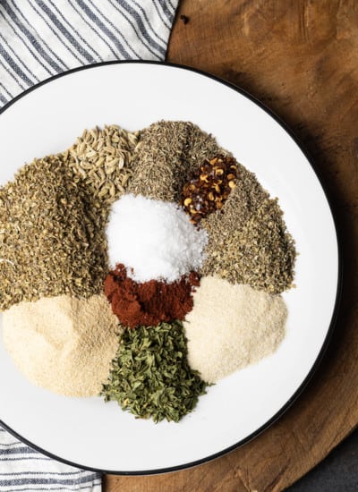 A little sprinkle of this magical pizza seasoning fairy dust makes every pizza better, and happily it takes 5 minutes to toss together. Having a jar of this homemade pizza seasoning recipe on hand is non-negotiable. Whether you’re crafting homemade pizzas or gussying up a frozen pizza, this homemade seasoning blend elevates everything. Don’t stop at pizza, though; sprinkle it on popcorn, pasta, and more!