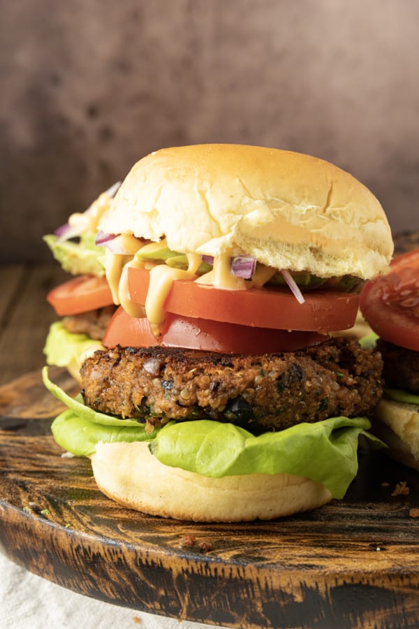 Full of fantastic texture and nobbly with black beans, these hearty and flavourful black bean quinoa burgers made with simple ingredients satisfy serious veggie burger cravings and big taste.