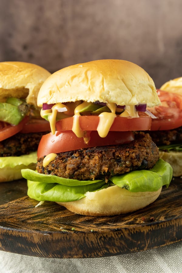 Full of fantastic texture and nobbly with black beans, these hearty and flavourful black bean quinoa burgers made with simple ingredients satisfy serious veggie burger cravings and big taste.