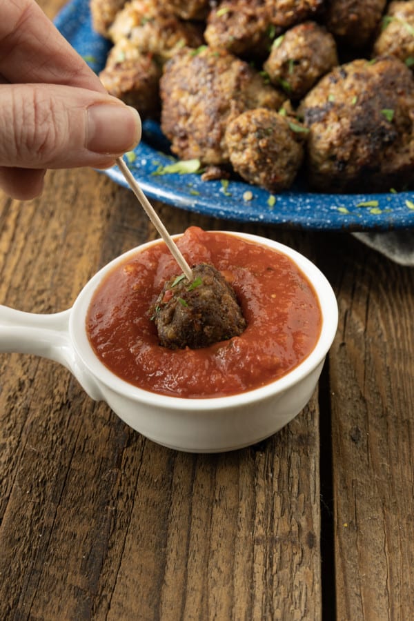 These easy gluten free meatballs are so succulent and savoury with a texture so perfect, you’ll judge all other meatballs by them! Whether you serve them with spaghetti sauce, turn them into Swedish meatballs, tuck them in the best meatball subs, or serve them on toothpicks as an appetizer, you’ll never miss the gluten!