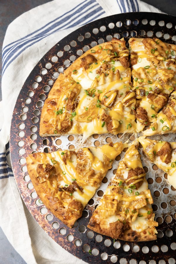 Chick Fil A Pizza is the glorious combination of two of the world’s great comfort foods: pizza and fried chicken. Inspired by the delicious fried chicken, waffle fries, and sauce at Chick Fil A, this special pizza is for all you fried chicken lovers out there. You may think you don't need a new recipe for pizza, but I promise you this easy one is worth branching out!