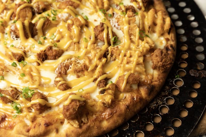 Chick Fil A Pizza is the glorious combination of two of the world’s great comfort foods: pizza and fried chicken. Inspired by the delicious fried chicken, waffle fries, and sauce at Chick Fil A, this special pizza is for all you fried chicken lovers out there. You may think you don't need a new recipe for pizza, but I promise you this easy one is worth branching out!