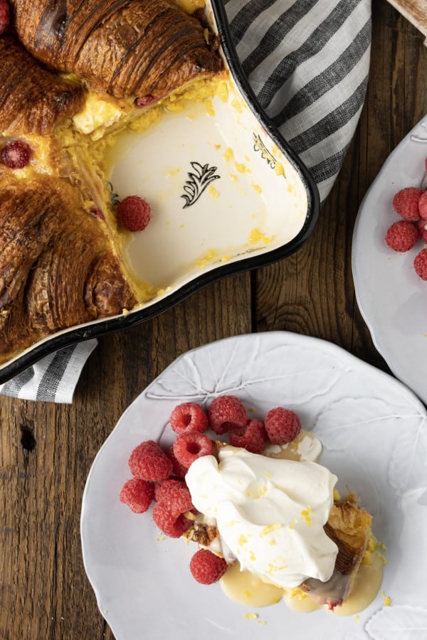 Rich, buttery, & indulgent, this creamy lemon and raspberry croissant bread pudding recipe is almost unbelievably easy to make. The flaky, layered croissant top gives way to the silky, vanilla and lemon scented custard that is studded with fresh raspberries. Optional cream cheese dotted through the custard makes this extraordinary decadent bread pudding taste a little like a cheesecake. It takes so few minutes of hands-on time to make any breakfast, brunch, or dessert a memorable occasion.