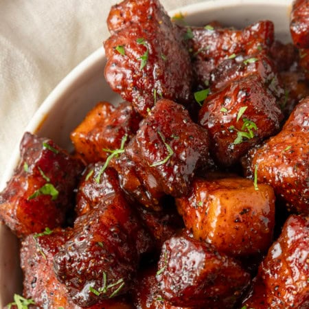 A pan filled with meat bites.
