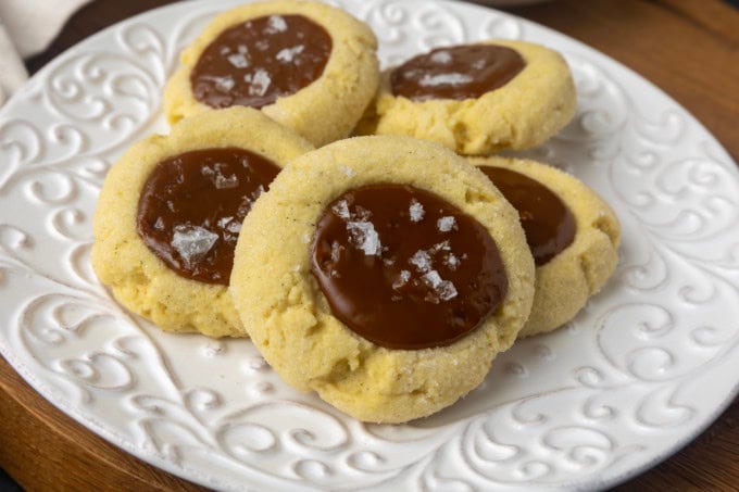 dulce de leche thumprint shortbread cookies on a plate