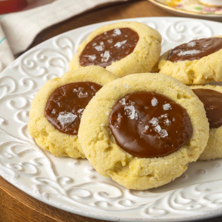 dulce de leche thumprint shortbread cookies on a plate