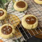 dulce de leche thumprint shortbread cookies on a plate