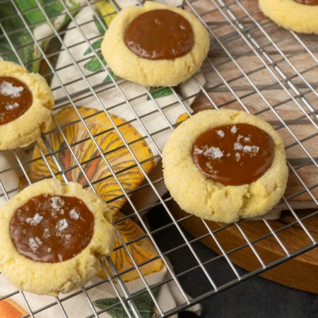 dulce de leche thumprint shortbread cookies on a plate