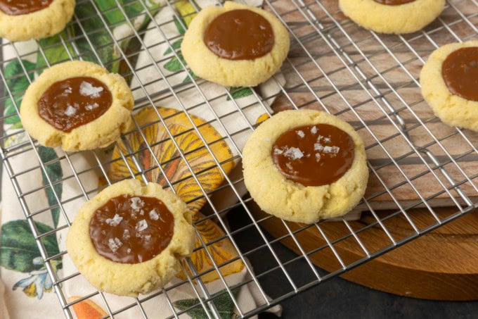 dulce de leche thumprint shortbread cookies on a plate