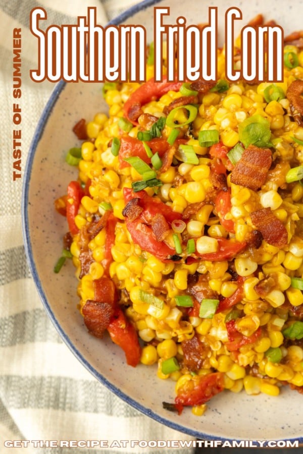 fried sweet corn with bacon, green onions and roasted red peppers in a bowl with text describing the photo