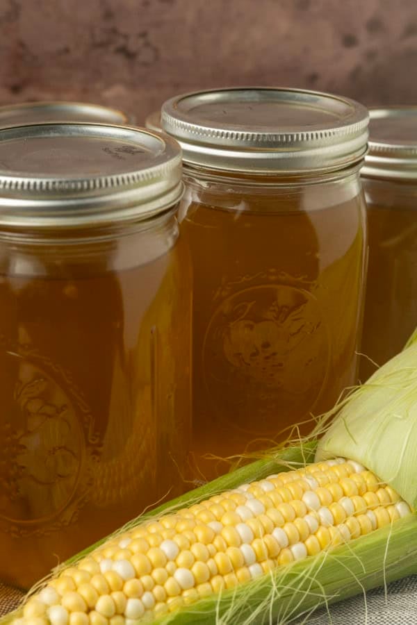 corn stock with an ear of sweet corn