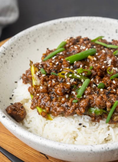 mongolian ground beef on rice in a bowl