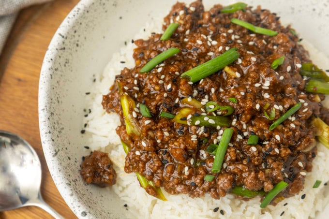 mongolian ground beef on rice in a bowl