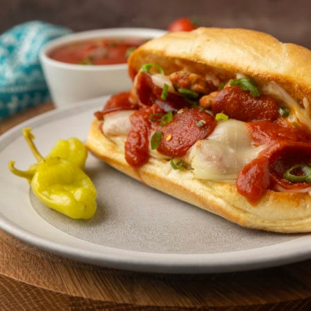 pizza sub sandwich on a plate