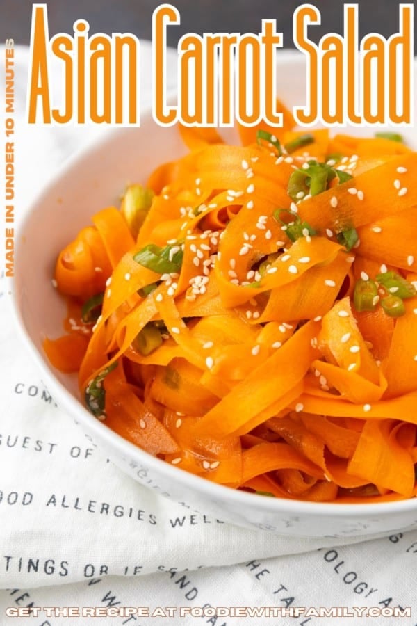 carrot ribbon salad in a white bowl with text overlay describing the photo
