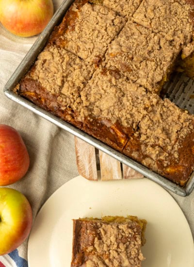 apple coffee cake in a pan and on a plate