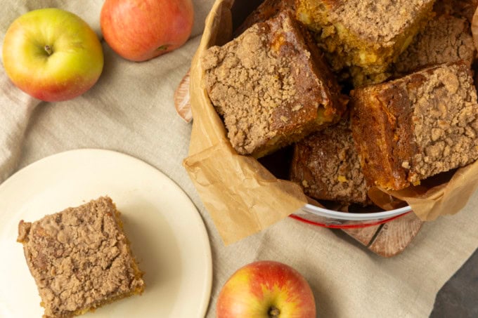 apple coffee cake in a tin and on a plate
