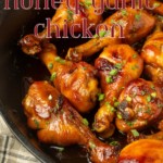 baked honey garlic chicken in a cast-iron pan