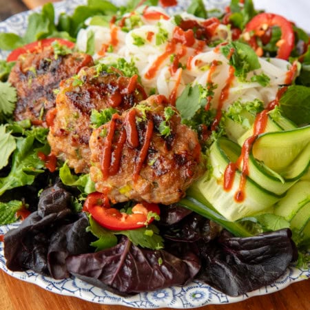 bun cha vietnamese pork patties on salad