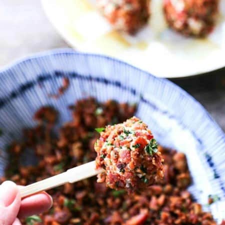 Chicken Bacon Ranch Cheese Ball Bites are the ultimate party food. Two-bite chicken and cheese balls completely crusted in crispy bacon and fresh parsley!