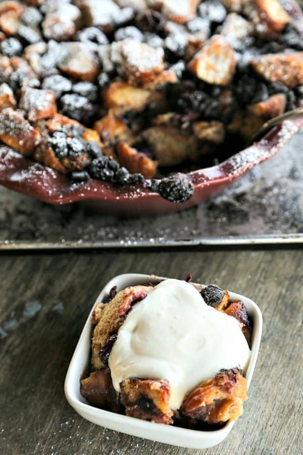 Chocolate Cherry Doughnut Bread Pudding is the creamiest, richest, most souffle-like bread pudding of leftover doughnuts, dark chocolate chunks, and sweet, black cherries. 