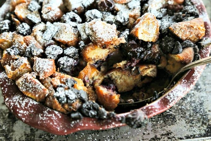 Chocolate Cherry Doughnut Bread Pudding is the creamiest, richest, most souffle-like bread pudding of leftover doughnuts, dark chocolate chunks, and sweet, black cherries. 
